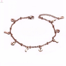 Venta caliente simple oro rosa a granel clave cerradura encantos pulsera tobillera